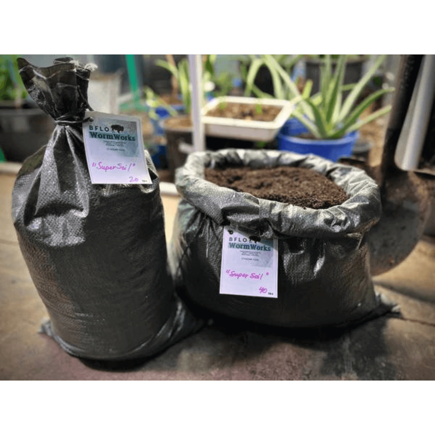 BFLO Worm Works hand-harvested earthworm castings in 20 lb bags, eco-friendly plant nourishment.