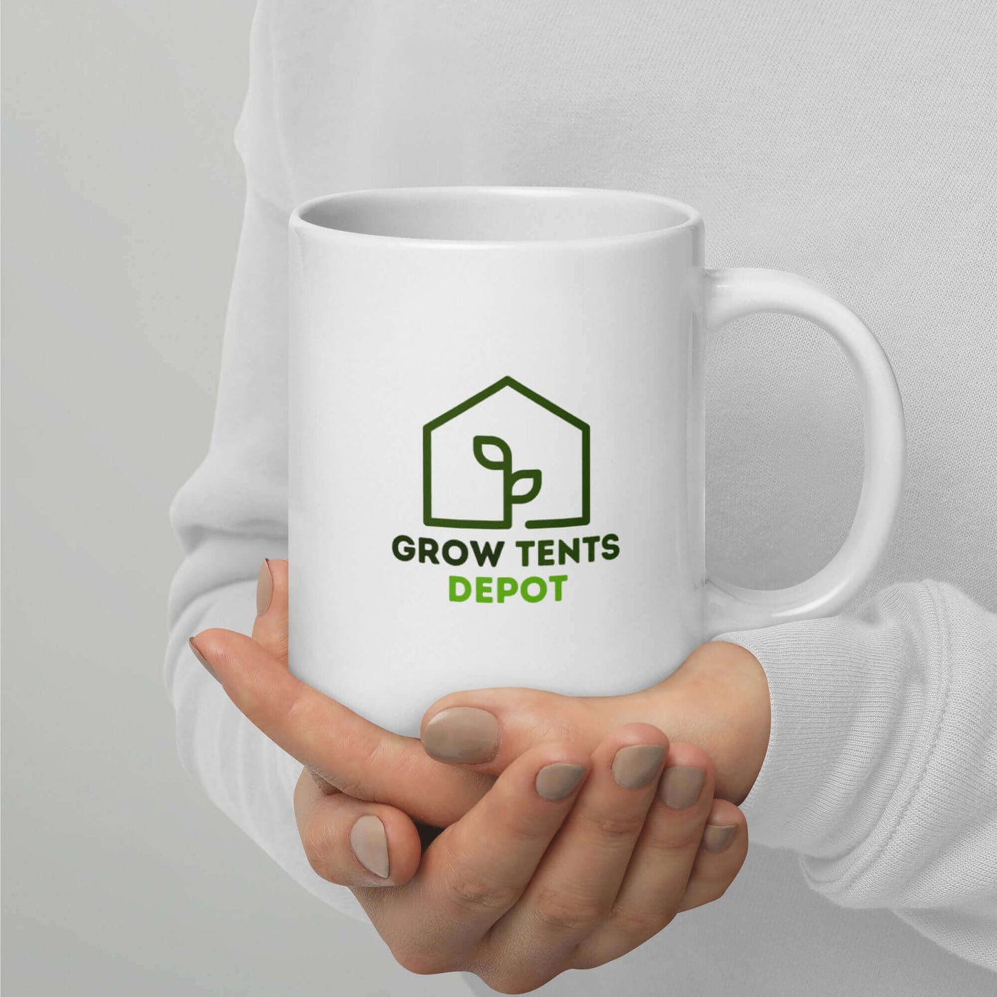 "Grow Tents Depot 20 Oz White Mug in hands, showcasing sturdy ceramic design, microwave and dishwasher safe, perfect for coffee or tea"